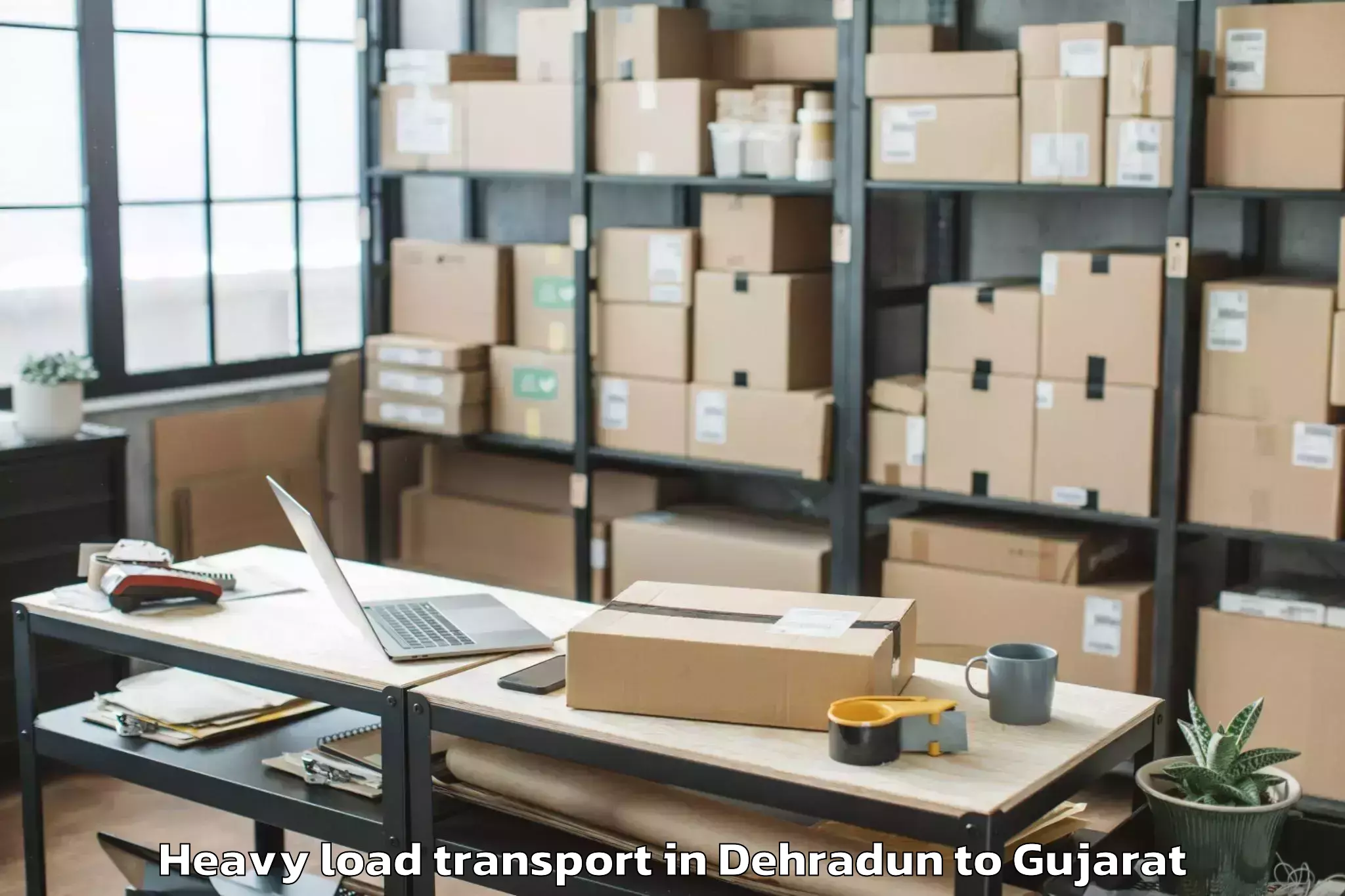 Top Dehradun to Dharampur Valsad Heavy Load Transport Available